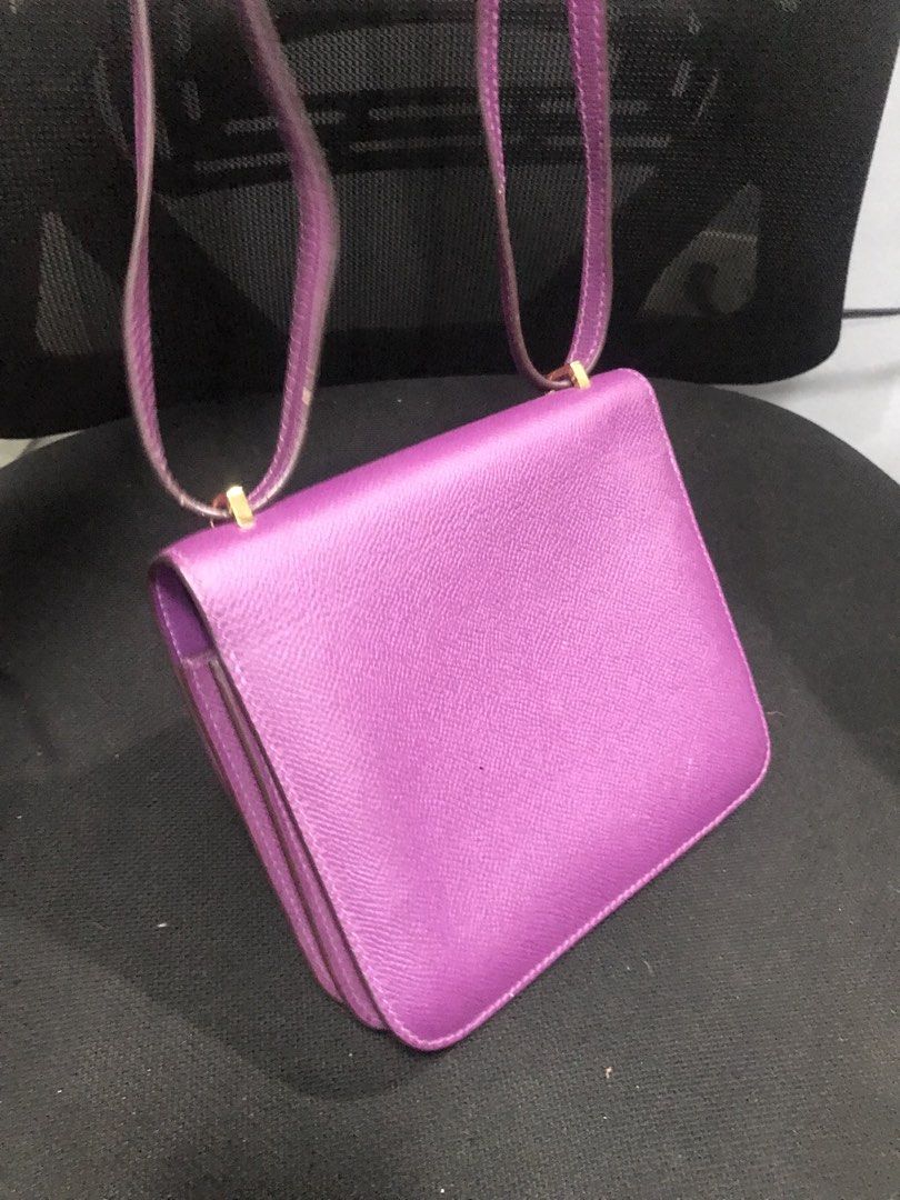 Hermes Constance Mini Bag - Purple Epsom Leather (Category: Luxury Bags & Wallets) located in Manila. Submitted by heycessygirl (Listing ID 1450659271, Image 3). Description: Purple Hermes Constance Bag - Material: Epsom Leather - Hardware: Gold - Size: Small (perfect for essentials) - Features: Adjustable strap, clean interior - Condition: Good, with minor signs of wear on strap and hardware.