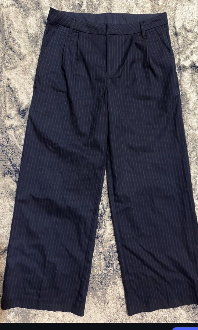 H&M Divided Pinstripe Suit Trousers (Category: Other Bottoms) located in Manila. Submitted by debbiecoca0801 (Listing ID 1450667033, Image 2). Description: - H&M Divided navy blue pinstripe suit trousers - Wide leg fit - Cropped length - Pleated front detail - Perfect for dressing up or down - DM for more photos and details.