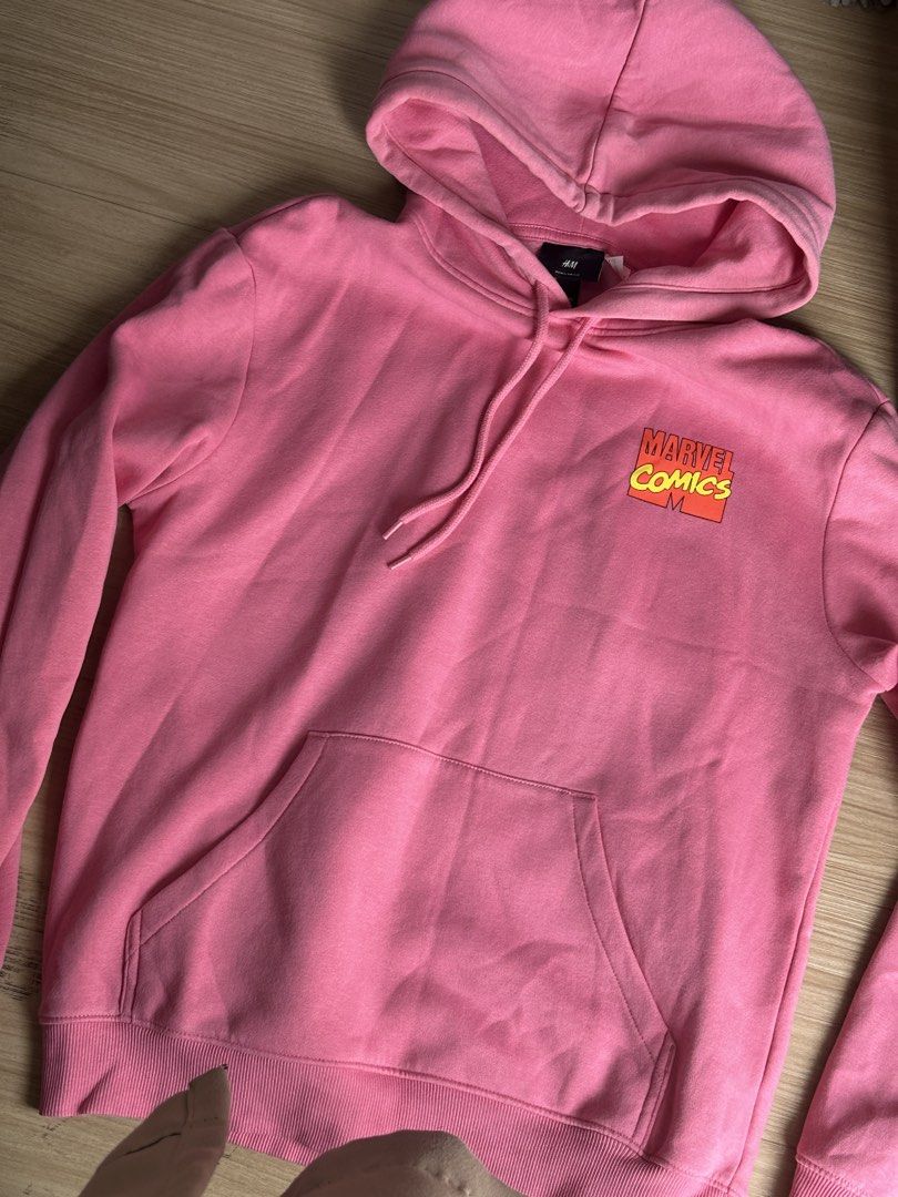 H&M Marvel Comics Pink Hoodie (Category: Hoodies) located in Quezon City. Submitted by prelovednd21 (Listing ID 1450603121, Image 2). Description: - Pink H&M hoodie - Features Marvel Comics graphics on front and back - Regular fit - Size XS - Ideal for Marvel fans.