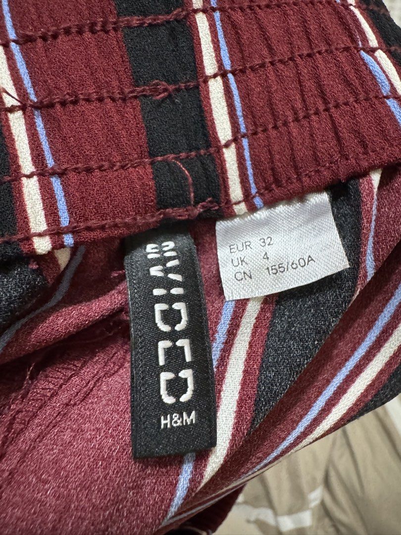 H&M Striped Wide Leg Culottes Pants (Category: Other Bottoms) located in San Pedro. Submitted by abbbnnn (Listing ID 1450615218, Image 2). Description: H&M striped culottes (maroon, black, white, blue). Elastic waist, wide leg, cropped. Perfect for casual or dressed-up looks..