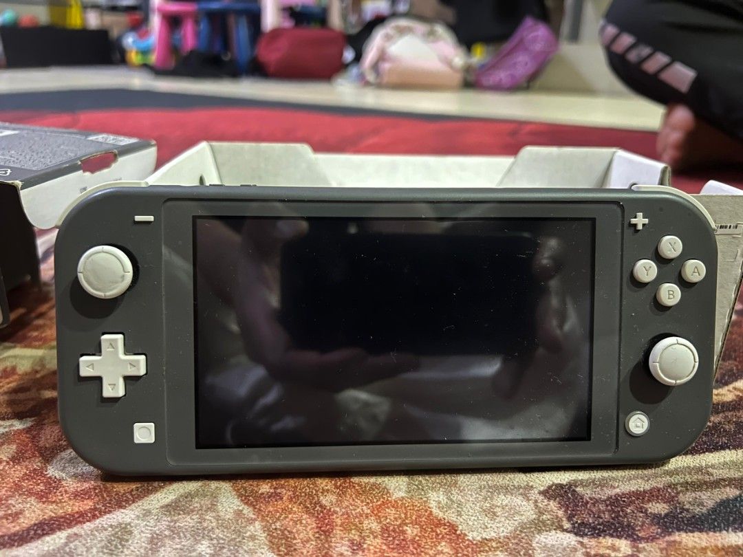 jailbroken switch lite (Category: Nintendo) located in Kuala Lumpur. Submitted by aaronthehe35793 (Listing ID 1450565179, Image 2). Description: - Nintendo Switch Lite (Gray) - picofly chip installed - chip only (no sd) .