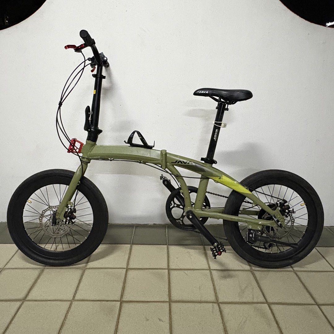 Java Zelo Foldable Bicycle (Category: Bicycles) located in Singapore. Submitted by frl69.pl (Listing ID 1450710376, Image 1). Description: need to do gear servicing other than that all ok red front block will be dekit other than that, what u see is what you get - carbon m handlebar - red brake levers - bottle holder.