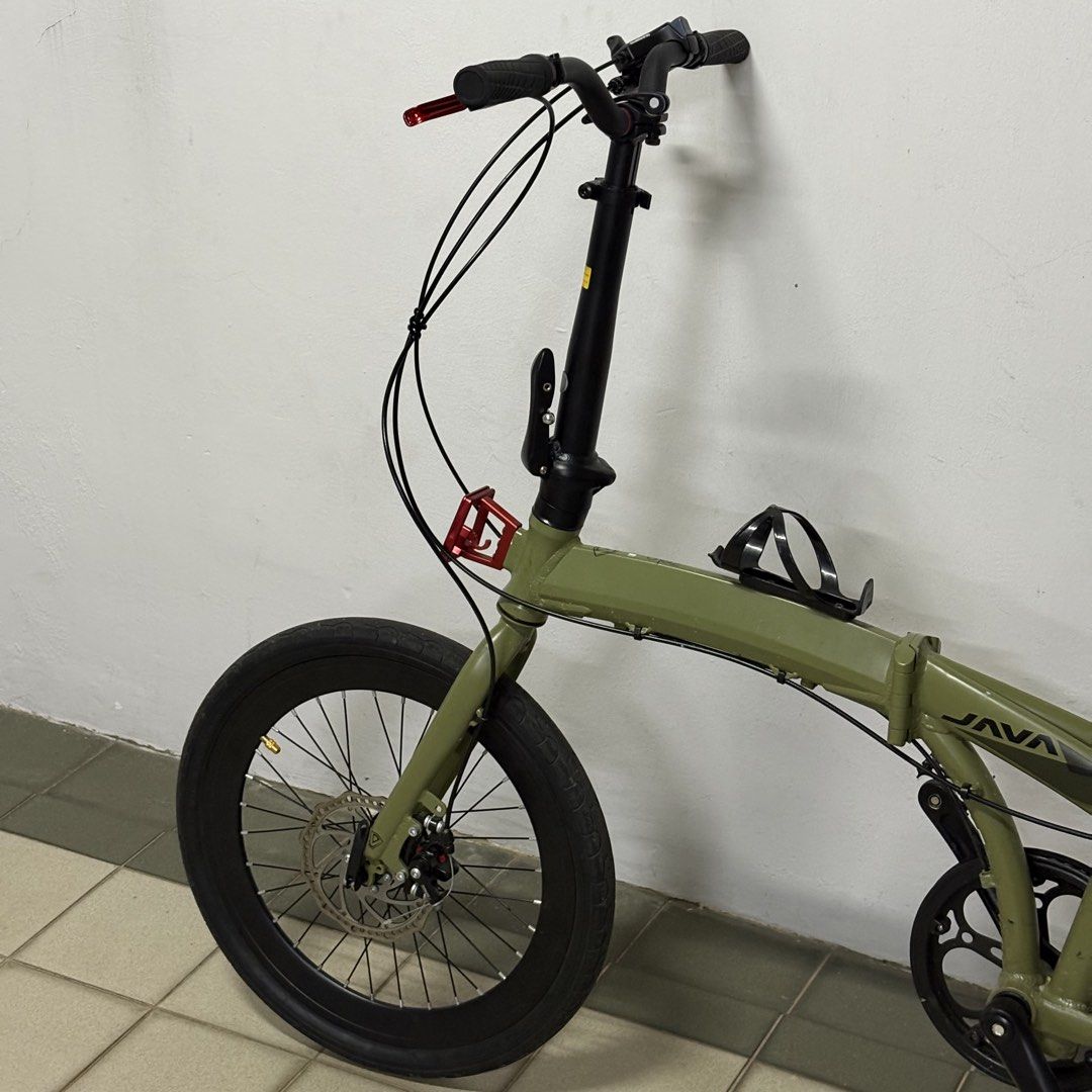 Java Zelo Foldable Bicycle (Category: Bicycles) located in Singapore. Submitted by frl69.pl (Listing ID 1450710376, Image 2). Description: need to do gear servicing other than that all ok red front block will be dekit other than that, what u see is what you get - carbon m handlebar - red brake levers - bottle holder.