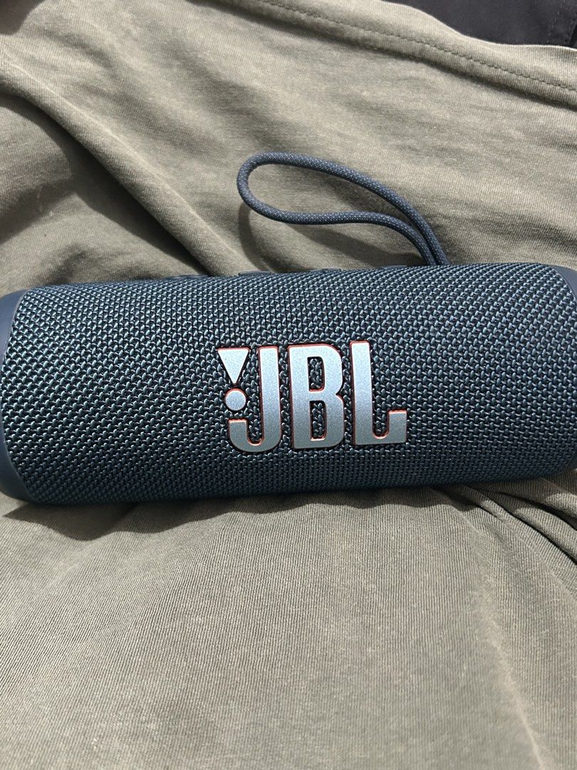 JBL Flip 6 Portable Waterproof Bluetooth Speaker (Category: Soundbars, Speakers & Amplifiers) located in Manila. Submitted by noblewind.bada92 (Listing ID 1450614680, Image 3). Description: - JBL Flip 6 Speaker - Color: Dark Blue - Portable and Waterproof - Bluetooth Connectivity - USB-C Charging Port - Includes Wrist Strap - Excellent Sound Quality for its Size - Easy to Carry Around.