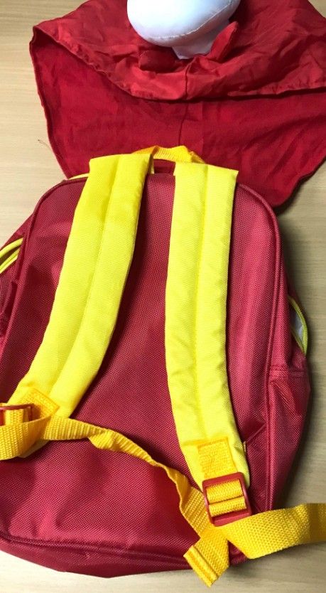 Jollibee Red and Yellow Backpack (Category: Babies & Kids Fashion) located in Bacoor. Submitted by qualityucantrust (Listing ID 1450698832, Image 2). Description: - Adorable Jollibee character design - Vibrant red color with yellow straps - Adjustable shoulder straps for a comfortable fit - Ideal for school, travel, or everyday use - Made with durable materials - A perfect gift for your little Jollibee fan! FREEBIE: 3pcs Jolitoy FIX PRICE SUREBUY