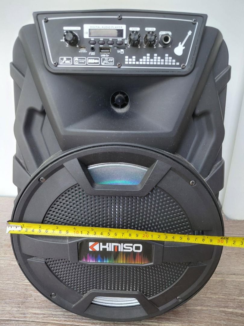 KIMISO Portable Speaker with Lights (Category: Soundbars, Speakers & Amplifiers) located in San Juan City. Submitted by salesite (Listing ID 1450651499, Image 3). Description: - Portable speaker with built-in digital audio player - Controls for volume, EQ, and microphone input - Features vibrant, colorful LED lights - Ideal for parties and outdoor gatherings - Dimensions: Approximately 19 inches tall and 11 inches wide.