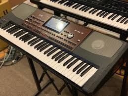Korg Pa700 61-key Arranger Workstation (Category: Musical Instruments) located in Caloocan City. Submitted by mysticturtle.6a146f (Listing ID 1450648072, Image 2). Description: For sale: Korg PS700 keyboard with a large touchscreen and many controls. Comes with a black metal stand. Perfect for music production or live performance..