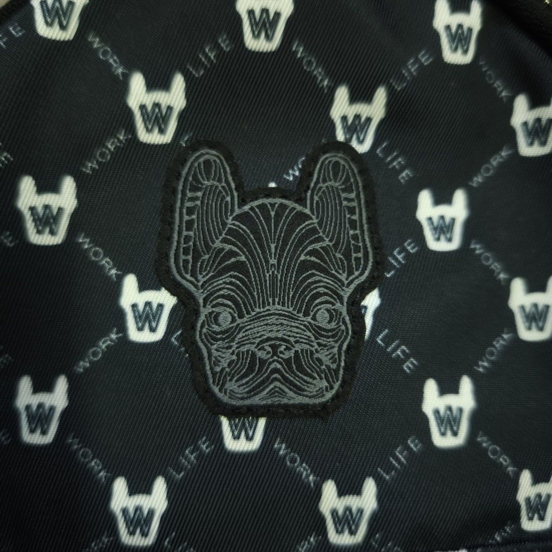 LIFEWORK Monogram Mini Backpack (Category: Backpacks) located in Cheras. Submitted by hypestandard (Listing ID 1450717394, Image 3). Description: - LIFEWORK Monogram Mini Backpack - Black Colour - Measurements 20cm (w) x 27cm (h) x 7.5cm (d) - Front patch of a French bulldog face - Main zip compartment - Smaller front zip pocket - Adjustable straps - Comes with 'LIFEWORK' tag - Ideal for everyday use or travel.