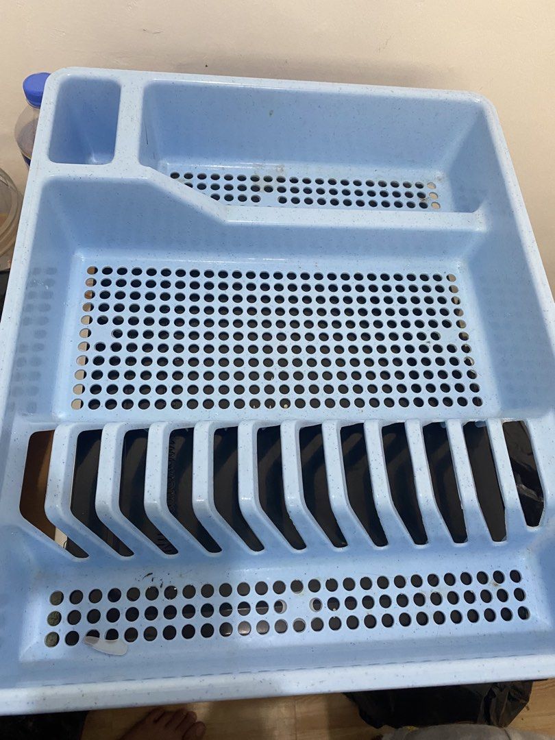 Light Blue Plastic Dish Rack with Utensil Holder (Category: Food Organization & Storage) located in Las Pinas. Submitted by allaroundseller (Listing ID 1450646696, Image 2). Description: - Light blue plastic dish rack - Slots for plates and cups - Separate section for cutlery - Effective water drainage - Ideal for organizing kitchen sink area - Minor signs of use, but fully functional - Ready for a new home.