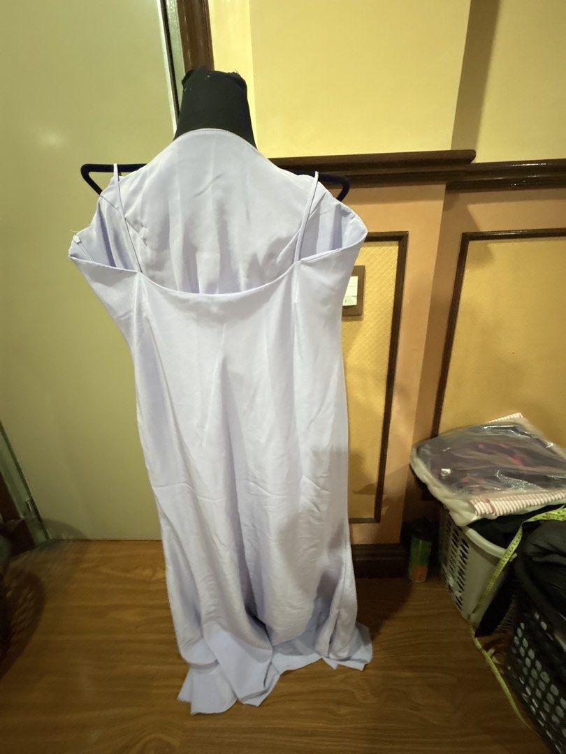 Light Purple Spaghetti Strap Maxi Dress (Category: Dresses) located in Manila. Submitted by dig76 (Listing ID 1450604618, Image 2). Description: - Light purple maxi dress - Spaghetti straps - Flowy and simple design - Ankle length - Material with a slight sheen - Versatile for casual outings or dressing up.