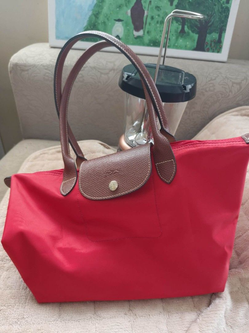 Longchamp Le Pliage Tote Bag Red (Category: Luxury Bags & Wallets) located in Iloilo. Submitted by kaffaqueen (Listing ID 1450606542, Image 1). Description: .