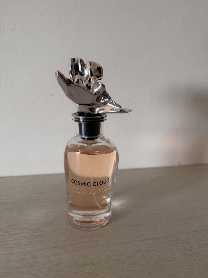 Louis Vuitton Cosmic Cloud Perfume (Category: Fragrance & Deodorants) located in Pasig City. Submitted by nikitty (Listing ID 1450668449, Image 2). Description: Class A Louis Vuitton Cosmic Cloud perfume. Beautiful floral-inspired cap. The liquid is a light pink hue. Bottle is clear glass. Great scent for everyday wear. RFS: Impulsive buying No box Can do meet up in ayala 30th pasig or pick up via lalamove (Paabono or Payment first only) last pri
