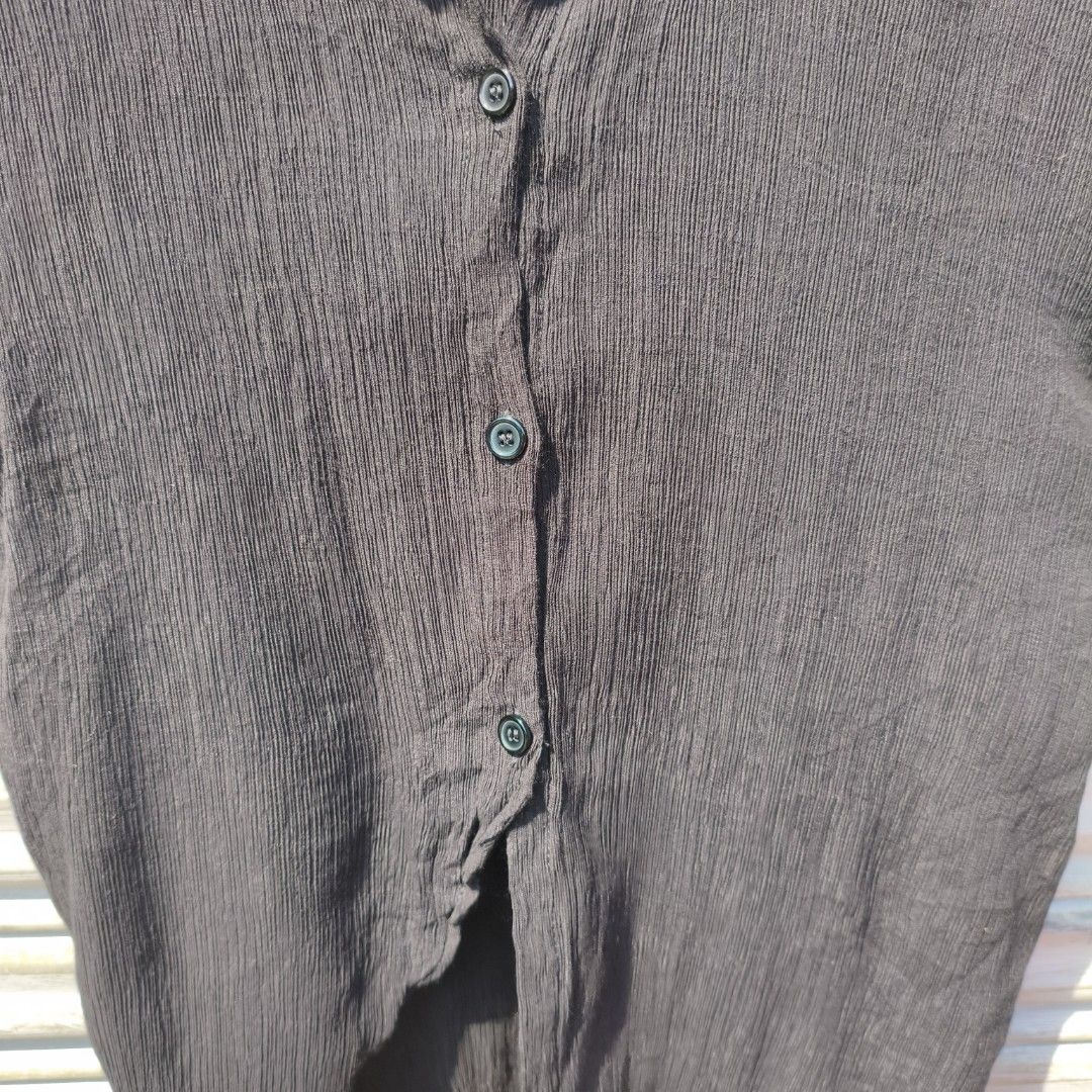 (medium ladies) micro pleats asymmetrical shirt (Category: Shirts) located in Lucena. Submitted by minryism (Listing ID 1450570150, Image 2). Description: micro pleats asymmetry black shirt 🌞🌞fits medium ladies 🌸🌸fits xs- small guys onli: 200 Length: 29 in Width (pit to pit):19 in Shoulder:15 in Sleeves:8.5 in Arm opening: 11 in paired with ur v flowy skirt or micro shorts laban na has highlow length cab easily dress up or down depending kung