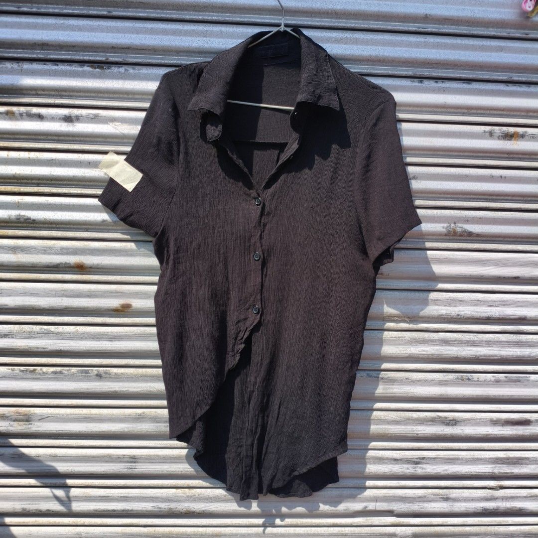 (medium ladies) micro pleats asymmetrical shirt (Category: Shirts) located in Lucena. Submitted by minryism (Listing ID 1450570150, Image 1). Description: micro pleats asymmetry black shirt 🌞🌞fits medium ladies 🌸🌸fits xs- small guys onli: 200 Length: 29 in Width (pit to pit):19 in Shoulder:15 in Sleeves:8.5 in Arm opening: 11 in paired with ur v flowy skirt or micro shorts laban na has highlow length cab easily dress up or down depending kung
