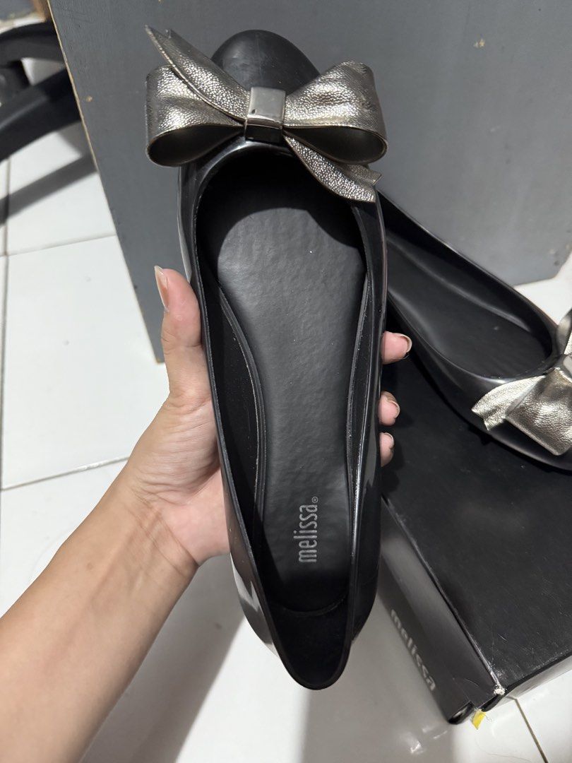 Melissa AD Doll Shoes (Category: Flats & Sandals) located in Las Pinas. Submitted by rahneis (Listing ID 1450671626, Image 2). Description: Melissa Doll Shoes III Black / Silver (Ribbon) US7 but maluwag sakin. Fits better with US7.5 Womens With Box With signs of usage RFS: Declutter SF: Shoulder by the buyer.
