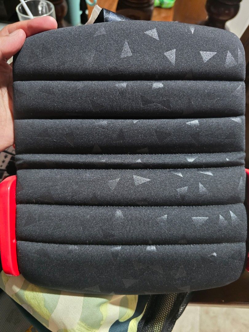 mifold Grab-and-Go Booster Seat (Category: Car Seats) located in Quezon City. Submitted by kbb.12345 (Listing ID 1450603040, Image 2). Description: - Compact and portable booster seat - Folds small for easy travel and storage - Simple and easy to use - Ideal for carpooling and road trips - Mifold brand: innovative safety and convenience design.