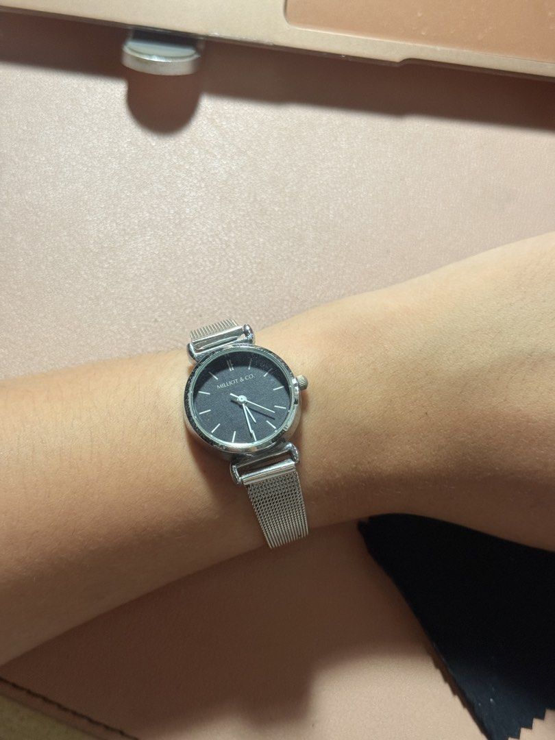 MILLIOT & CO. Silver Stainless Steel Mesh Strap Watch (Category: Women's Watches) located in Manila. Submitted by thriftchic__ (Listing ID 1450634006, Image 2). Description: - Brand: MILLIOT & CO. - NOTE: BATTERY NEEDS TO BE CHANGED. IT IS NOT WORKING ANYMORE. BOUGHT THIS FOR 1K+ - Strap: Silver mesh, adjustable with buckle closure - Face: Black - Back: Stainless steel - Style: Sleek, minimalist - Ideal for: Everyday wear.