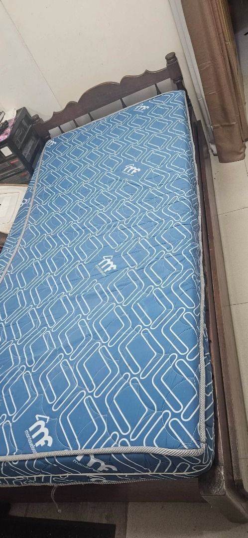 Narra bed frame w/ pullout bed & single size mattress (Category: Bed Frames & Mattresses) located in Pasig City. Submitted by calmdragon (Listing ID 1450725842, Image 2). Description: Made of Narra Has a pullout bed underneath Made for a single size mattress Superficial damage Pick-up only.