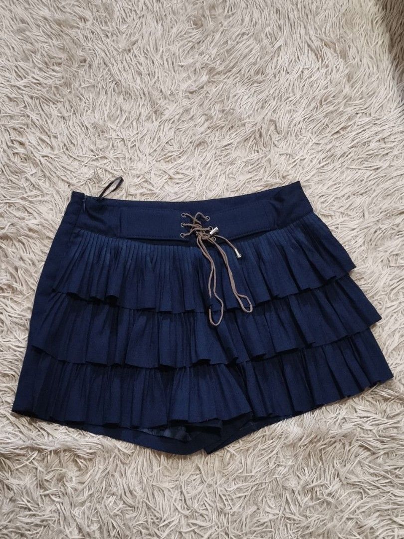 navy blue high waisted pleated ruffle skort (Category: Skirts) located in Taguig. Submitted by declutterwirsh (Listing ID 1450539206, Image 1). Description: - small on tag (24 - 25) - used once - used for a school event rfs: decluttering don't reach for it anymore.