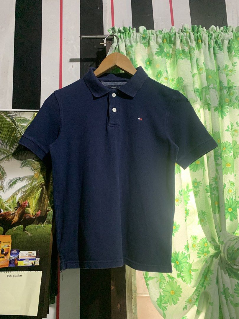 Navy Blue Tommy Hilfiger Poloshirt (Category: Tshirts & Polo Shirts ) located in Iligan City. Submitted by kierrehv (Listing ID 1450590248, Image 2). Description: Navy Blue Tommy Hilfiger Poloshirt 9.4/10 cr 17x21.5 No issues.