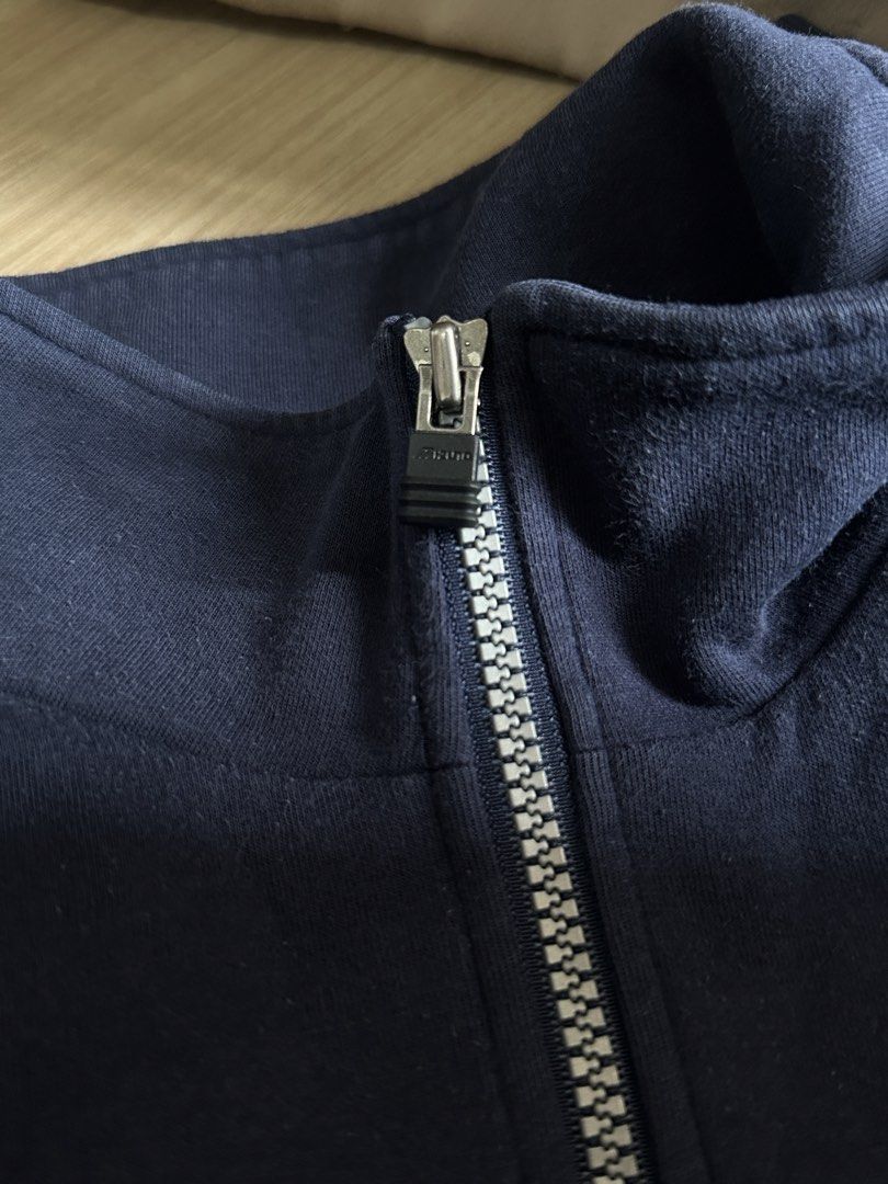 Navy Mizuno Quarter Zip Sweatshirt (Category: Coats, Jackets and Outerwear) located in Quezon City. Submitted by prelovednd21 (Listing ID 1450607076, Image 3). Description: - Navy blue Mizuno sweatshirt - Quarter zip neckline with silver zipper - Mizuno logo on chest - Ribbed cuffs and hem - Drawstring at bottom hem - Ideal for casual wear or sports (Issue yung tali sa baba naputol pero steal parin (see last pic).