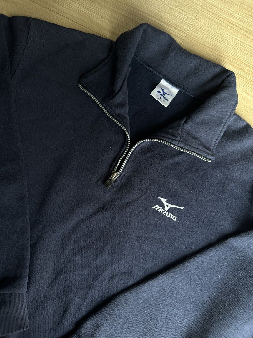 Navy Mizuno Quarter Zip Sweatshirt (Category: Coats, Jackets and Outerwear) located in Quezon City. Submitted by prelovednd21 (Listing ID 1450607076, Image 1). Description: - Navy blue Mizuno sweatshirt - Quarter zip neckline with silver zipper - Mizuno logo on chest - Ribbed cuffs and hem - Drawstring at bottom hem - Ideal for casual wear or sports (Issue yung tali sa baba naputol pero steal parin (see last pic).