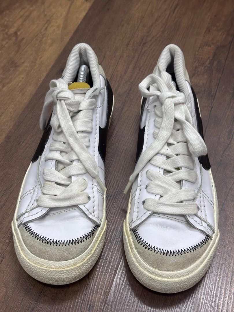 Nike Blazer Low White Black Leather Sneakers (Category: Sneakers) located in Kuala Lumpur. Submitted by kicksbundle.my (Listing ID 1450532352, Image 1). Description: - Classic Nike Blazer Lows - White leather with black swoosh - Some creasing on toe box - Laces are slightly yellowed - Size 7uk (26cm) Berminat? PM untuk ordedr.