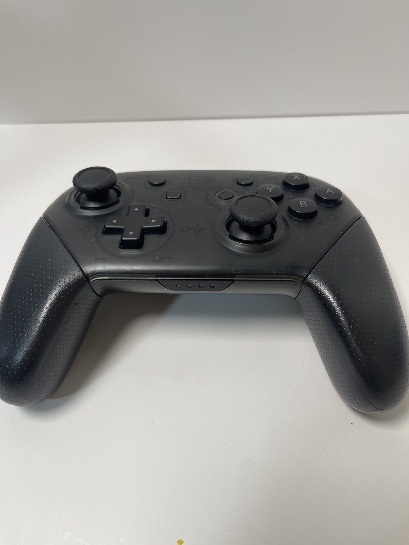 Nintendo Switch Pro Controller 🎮🔥 (Category: Controllers) located in Pasig City. Submitted by tjfindspreloveditems (Listing ID 1450654301, Image 2). Description: 🎮 FOR SALE 🎮 Nintendo Switch Pro Controller 🎮🔥 No box, no cable 💰 ₱1,690 📋 Condition: ✅ Well taken care of ✅ All buttons working ✅ No stick drifts Level up your gameplay with this reliable Pro Controller — great grip and precision for your favorite titles! 🎮🔥 📍 Ortigas 🚚 Nati