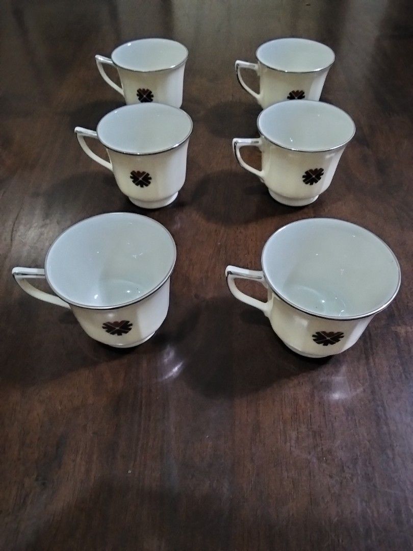 Noritake Ivory China Tea Cups Set (Category: Coffee & Tea Tableware) located in Antipolo. Submitted by olayerm1213 (Listing ID 1450632980, Image 2). Description: - Set of 5 Noritake Ivory China tea cups - Cream colored with a silver rim - Features a small floral design - Made in the Philippines - Ideal for morning tea or coffee - Clean and ready for a new home.