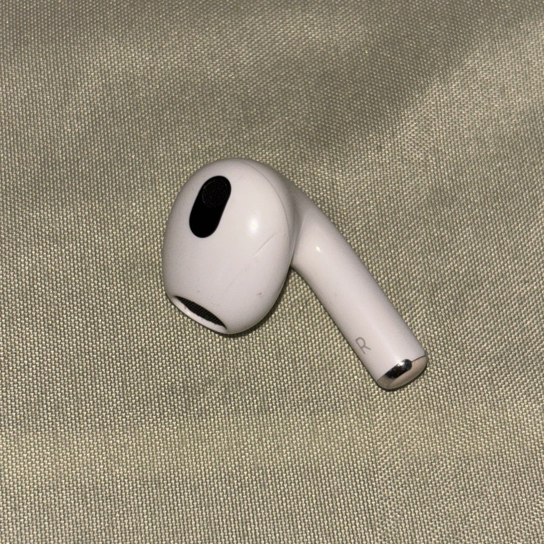 Original Apple AirPods (3rd Gen) – Right Pod Only (Category: Headphones & Headsets) located in Imus. Submitted by s444de (Listing ID 1450733433, Image 1). Description: - 100% working and original - has some minor dent due to magnet contact during MagSafe charging, but it doesn’t affect the performance at all. - slightly negotiable - i also have the left pod (₱2k); if need both pods ₱3.8k rfs: missing charging case.