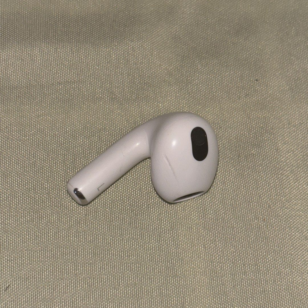 Original Apple AirPods (3rd Gen) – Left Pod Only (Category: Headphones & Headsets) located in Imus. Submitted by s444de (Listing ID 1450733598, Image 1). Description: - 100% working and original - has some minor dent due to magnet contact during MagSafe charging, but it doesn’t affect the performance at all. - slightly negotiable - i also have the right pod (₱ 2k); if need both pods ₱3.8k rfs: missing charging case.