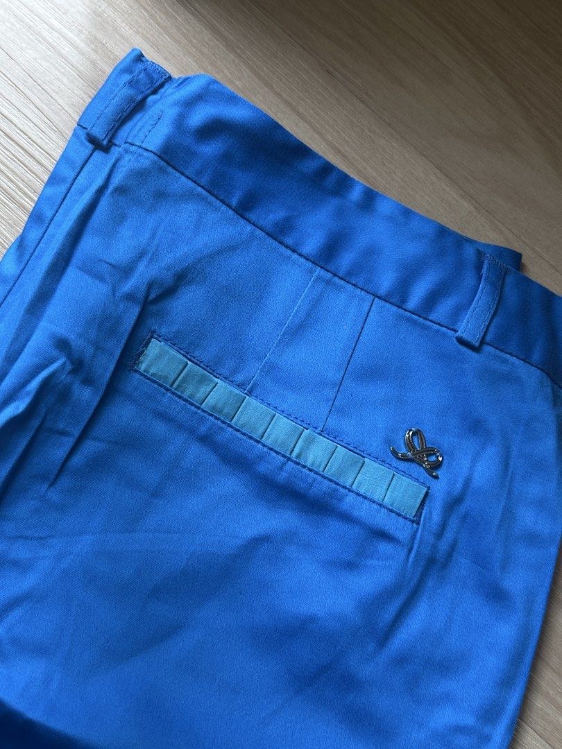 PLAINS & PRINTS Blue Trousers Size L (Category: Other Bottoms) located in Quezon City. Submitted by prelovednd21 (Listing ID 1450602154, Image 3). Description: - Brand: RAINS & PRINTS - Color: Blue - Size: L (fits UK 12) - Fit: Relaxed - Features: Blue ribbon detail on pockets - Occasion: Casual wear or dressing up.