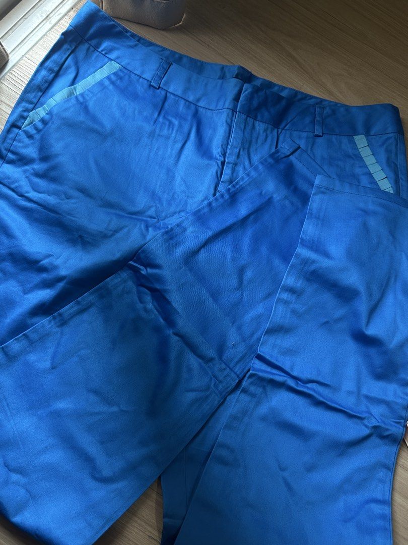 PLAINS & PRINTS Blue Trousers Size L (Category: Other Bottoms) located in Quezon City. Submitted by prelovednd21 (Listing ID 1450602154, Image 1). Description: - Brand: RAINS & PRINTS - Color: Blue - Size: L (fits UK 12) - Fit: Relaxed - Features: Blue ribbon detail on pockets - Occasion: Casual wear or dressing up.