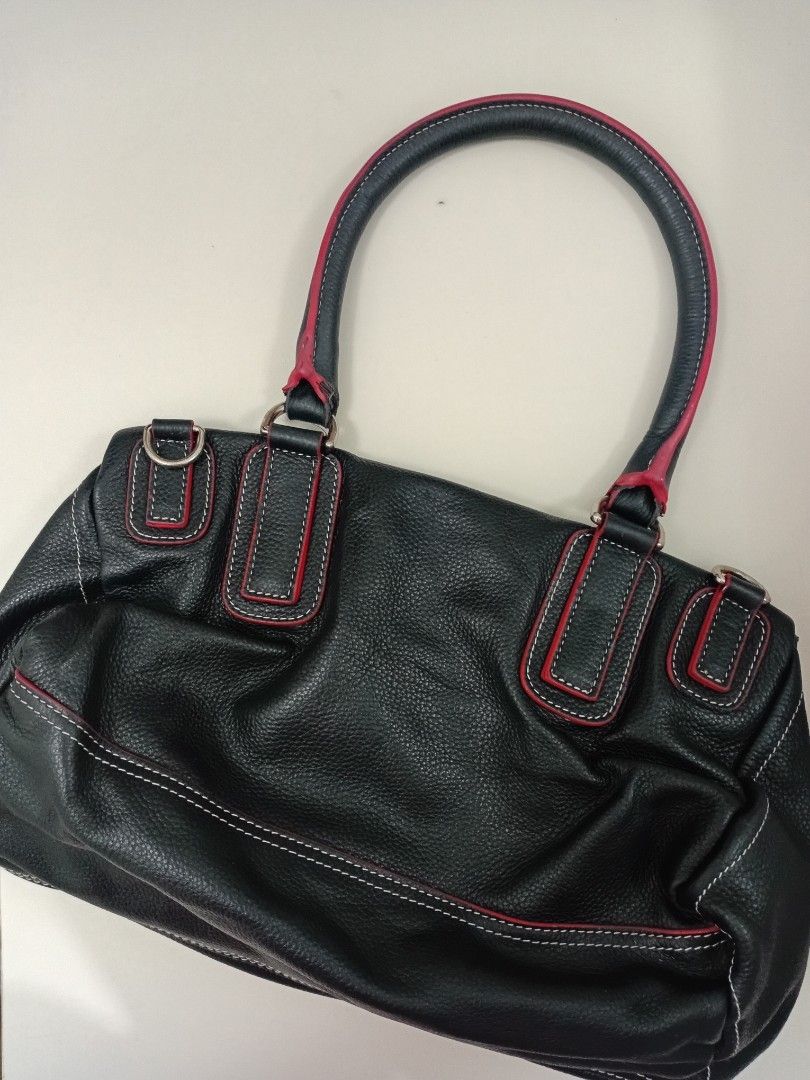 Givenchy Pandora Shoulder /hand Bag (Category: Luxury Bags & Wallets) located in Navotas City. Submitted by ms.soulana (Listing ID 1450685003, Image 2). Description: PreOwned Lightly Used Authentic 💯 Givenchy black Pandora bagwth Red Metallic logo Embossed on front Size : Small High Quality GIVENCHY YKK Zip - Stylish red accent details - Elegant silver hardware - Comfortable top handles - Multiple zippers and pockets for organized storage - Spac