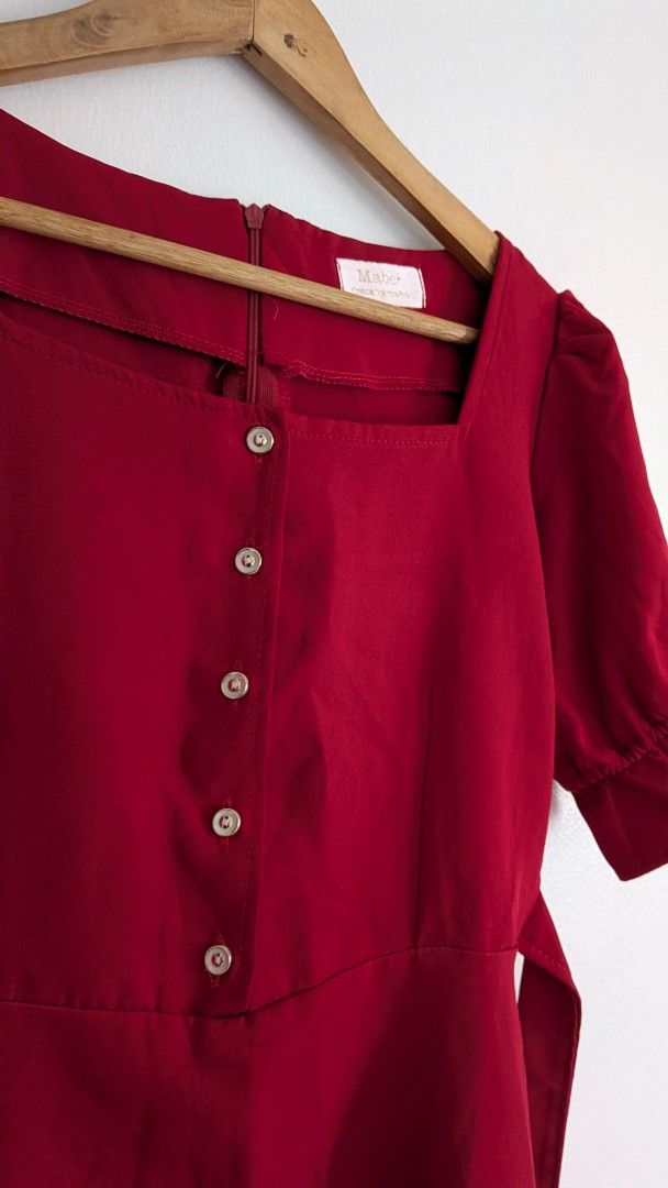 Red Square Neck Puff Sleeve Button Front Dress with Tie (Category: Dresses) located in Quezon City. Submitted by maff_mallow (Listing ID 1450537647, Image 3). Description: ✅Size: Medium, wistline: 25-29in ✅Condition: no issue, used once ✅ Length: from waistline bottom: 18.5 in ✅Color: Red Color may vary due to camera lightning ✅Flattering square neckline ✅Stylish puff sleeves with ruffled cuffs ✅Functional button front detail ✅Comes with a tie be