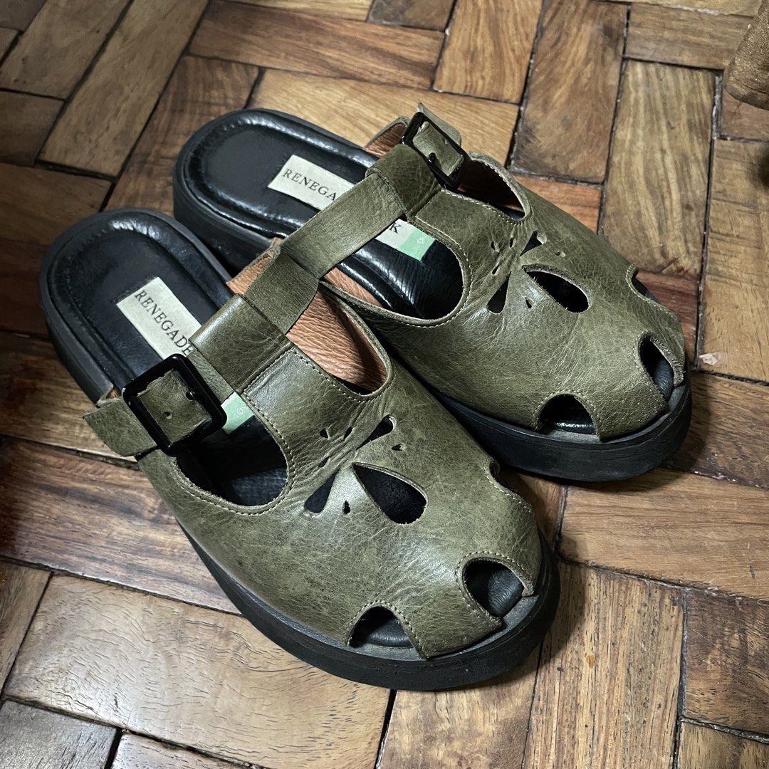 Renegade Folk Olive Green Leather Mules (Category: Flats & Sandals) located in Marikina City. Submitted by mary.franz (Listing ID 1450568635, Image 2). Description: - Brand: Renegade Folk - Color: Olive Green - Material: Leather - Design: Unique cut-out detail - Closure: Adjustable buckle strap - Sole: Platform sole for added height - Style: Easy slip-on - Occasion: Great for casual wear - RFS: Not my style anymore - No box, bought last February 
