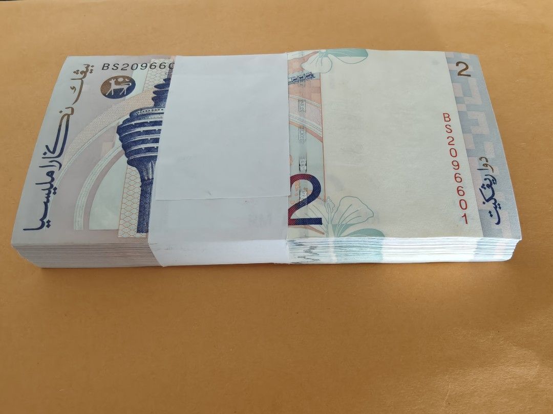RM2 Ringgit Stack 100pcs run (Category: Currency) located in Singapore. Submitted by titanic.collection (Listing ID 1450598888, Image 2). Description: - Bundle of RM2 banknotes from Bank Negara Malaysia - 100pcs running in order - Mailing can be arranged .