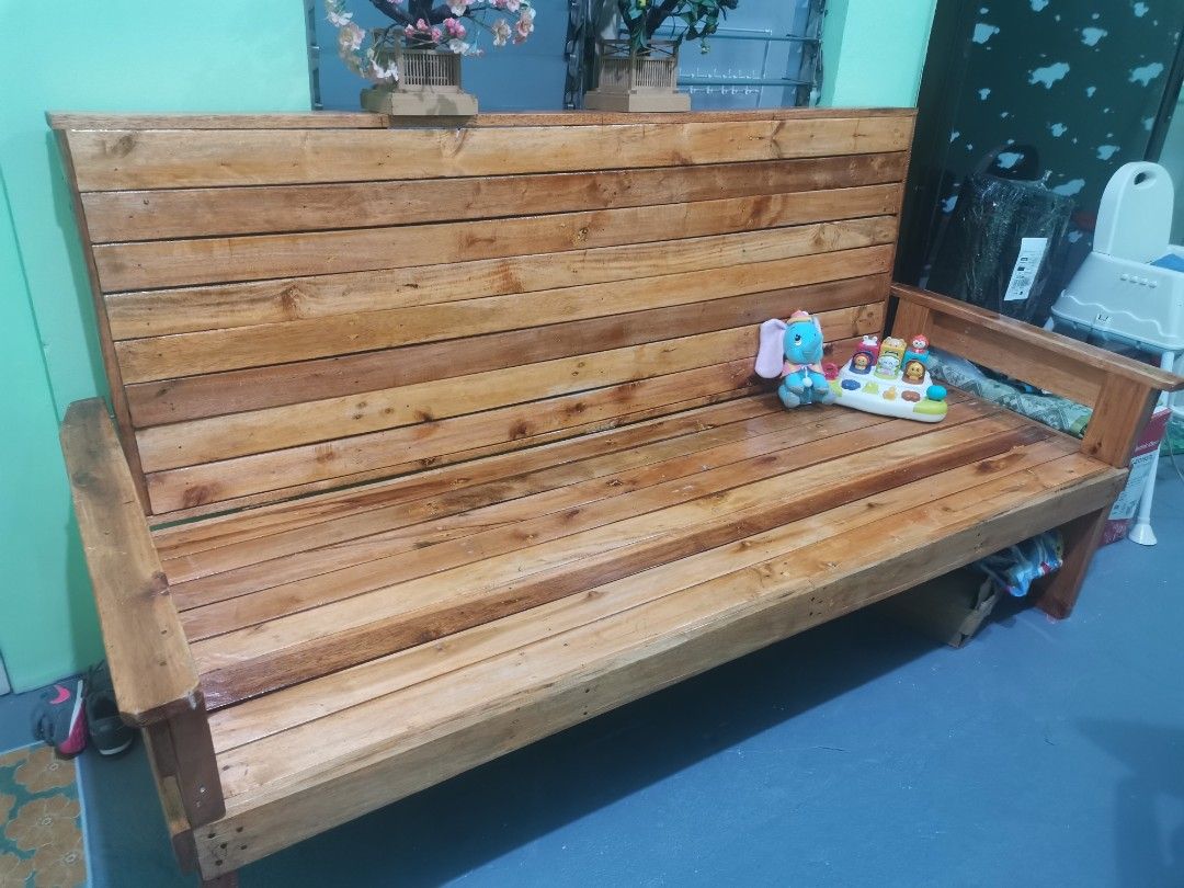 Solid Wood Bench - Rustic Outdoor/Indoor Seating (Category: Chairs) located in Pasig City. Submitted by healthnfeshn (Listing ID 1450540800, Image 2). Description: - large convertible bench - moving out so need to declutter - Sturdy wooden bench, perfect for patio or living room. - Crafted from solid wood planks with natural grain and color. - Ample seating space. - Ready to add charm to your space!.
