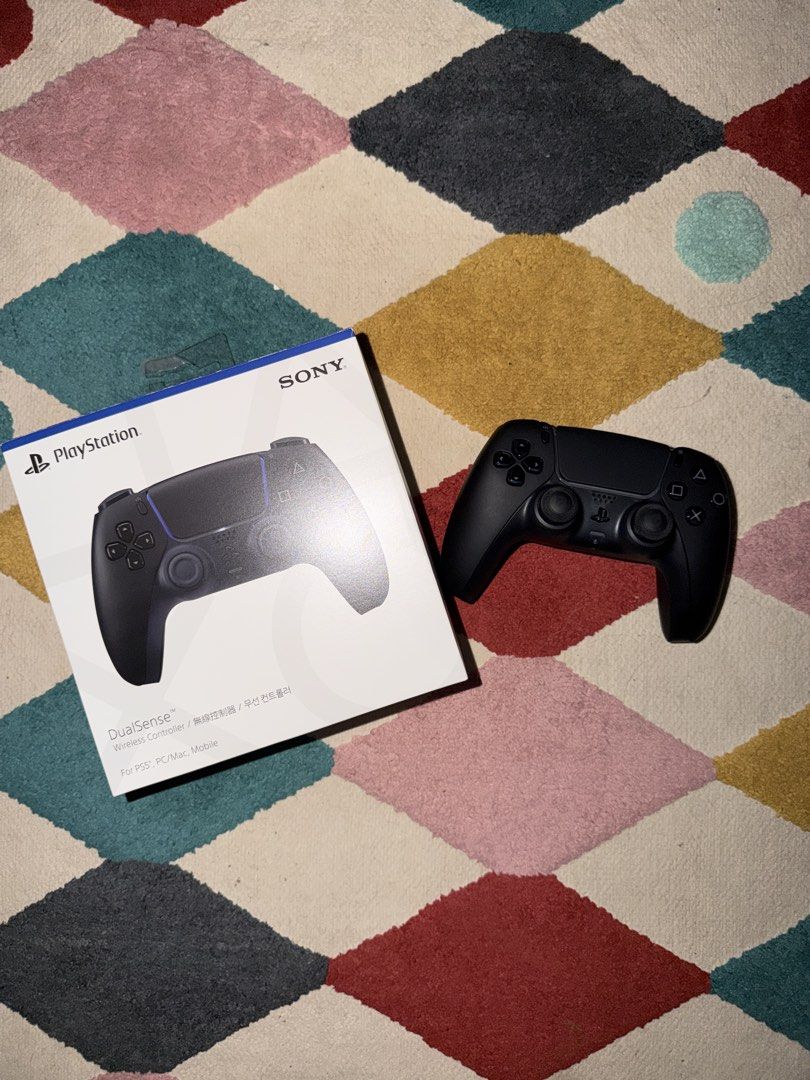 Sony DualSense Wireless Controller for PS5, PC, Mac, Mobile (Category: Controllers) located in Binan City. Submitted by techdistrict. (Listing ID 1450673259, Image 1). Description: - Black Sony DualSense wireless controller - Compatible with PS5, PC, Mac, and mobile devices - Comes with original box - Ideal for gaming on any platform - Includes Skull and Co Thumb grips.