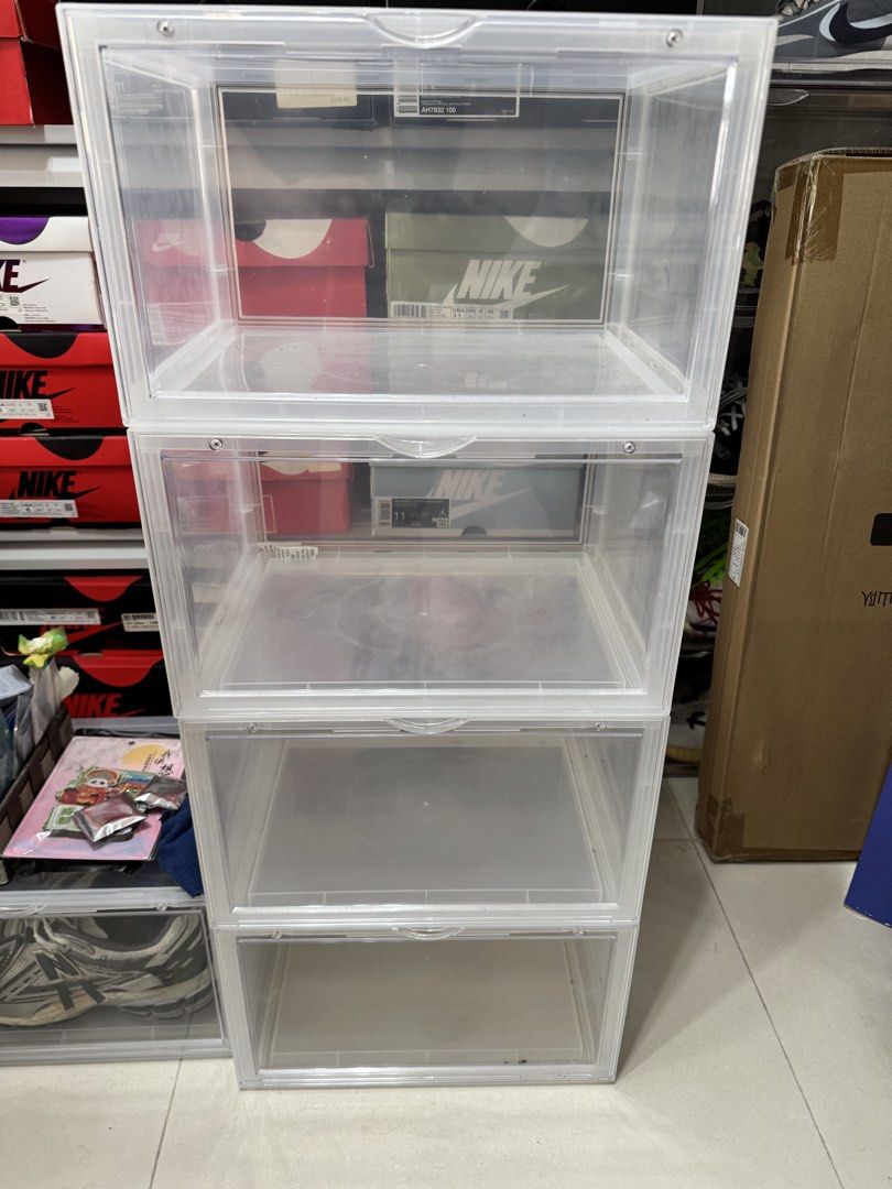 Stackable Clear Shoe Storage Boxes (Category: Storage Boxes & Baskets) located in Singapore. Submitted by dedotghost (Listing ID 1450599321, Image 1). Description: - 5 clear storage boxes ($10 each) - Stackable design to save space - Front panel opens for easy access - Sturdy construction - Ideal for organizing shoes and other items.