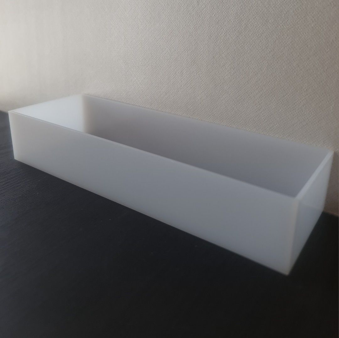 Stackable Storage Box - Narrow - White (Category: Storage Boxes & Baskets) located in Singapore. Submitted by sc02980 (Listing ID 1450631921, Image 1). Description: - Ideal for organizing small items - Keeps desks and drawers tidy - Stackable design - Easy to clean - 1 for $4.00, 2 for $7.00.
