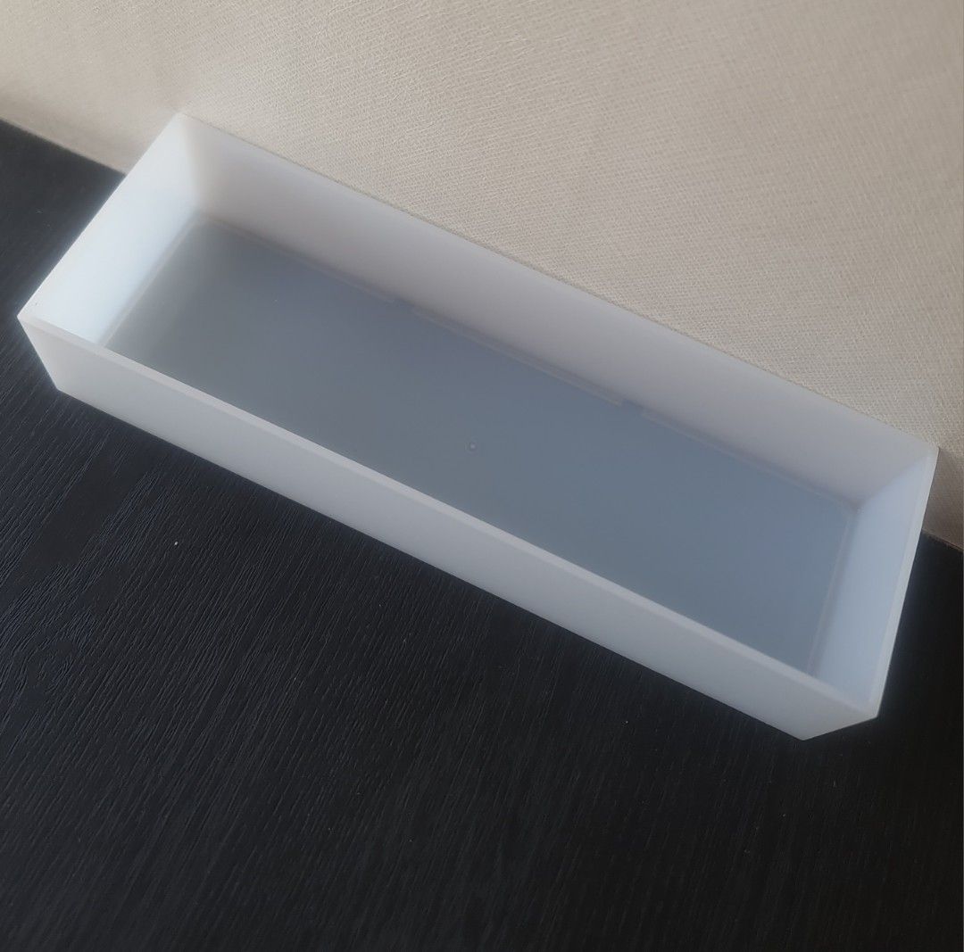 Stackable Storage Box - Narrow - White (Category: Storage Boxes & Baskets) located in Singapore. Submitted by sc02980 (Listing ID 1450631921, Image 2). Description: - Ideal for organizing small items - Keeps desks and drawers tidy - Stackable design - Easy to clean - 1 for $4.00, 2 for $7.00.