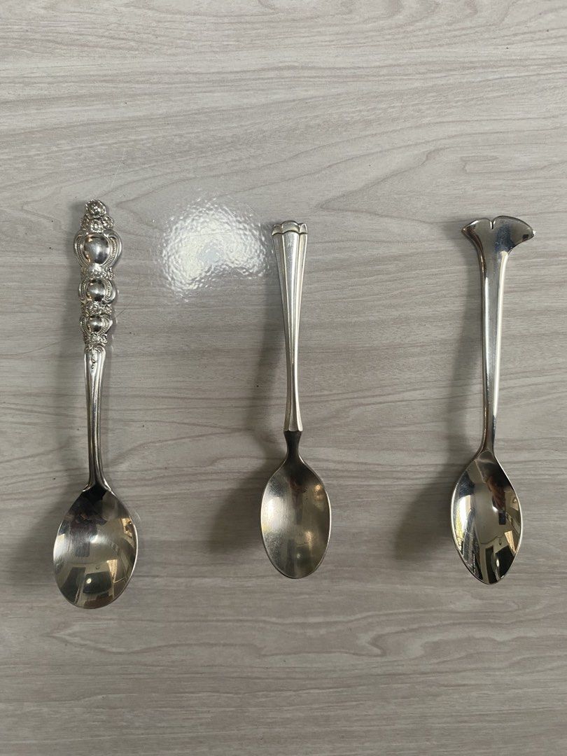 Stainless Spoons (Category: Dinnerware & Cutlery) located in Quezon City. Submitted by keijisuke (Listing ID 1450691805, Image 1). Description: - Set of 3 decorative spoons - Unique handle designs - Ideal for display or as unique serving pieces.