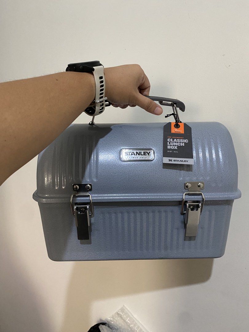 Stanley Classic Lunch Box Gray (Category: Food Organization & Storage) located in Manila. Submitted by k0pimonster (Listing ID 1450695486, Image 1). Description: - Classic Stanley lunch box in grey. - Iconic ribbed design for a timeless look. - Has DENTS at the center near the label and at the left side (see photos).