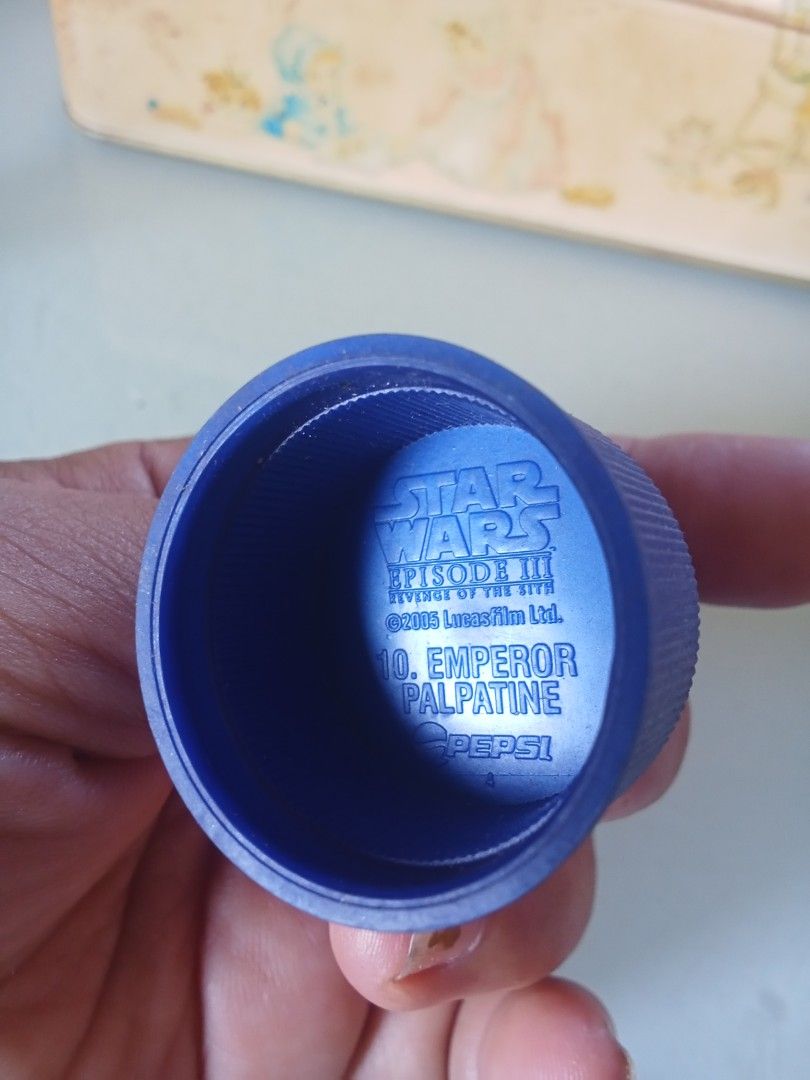 Star Wars Pepsi Bottle Cap Collection (Category: Vintage Collectibles) located in Bocaue. Submitted by marajapansurplus (Listing ID 1450532934, Image 2). Description: - Authentic Emperor Palpatine figure from Star Wars Episode III - Originally a Pepsi promotional item - Comes attached to a blue bottle cap - Small size with good detail - Perfect addition to any Star Wars collection.