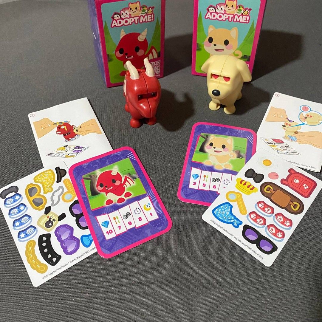 Take All Mcdo Adopt Me (Category: Designer & Blind Box Toys) located in Quezon City. Submitted by desuriia (Listing ID 1450557952, Image 1). Description: Adopt Me Dog and Dragon Both for P200 -All Intact (stickers/card game) - Dog - Dragon RFS: Decluttering Loc: Sikatuna Bliss QC (Pick-up/Lalamove Only).