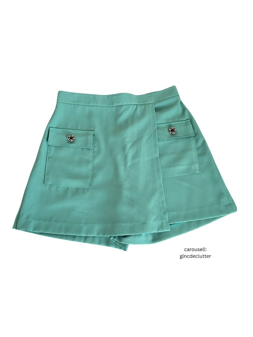 BKK Bangkok Skort (Category: Skirts) located in Antipolo. Submitted by glncdeclutter (Listing ID 1450672577, Image 1). Description: Basset Thailand Teal Skort - Soft, non-wrinkly fabric - Decorative buttons - Zipper is functional and without issues - Neat stitching - Skort is so cute and can be worn with simple tops for brunches or dates Size L on tag, fits 28-30 waist Bought in Thailand for around 1k. Worn only twice. Good as new. RFS: Declutter
