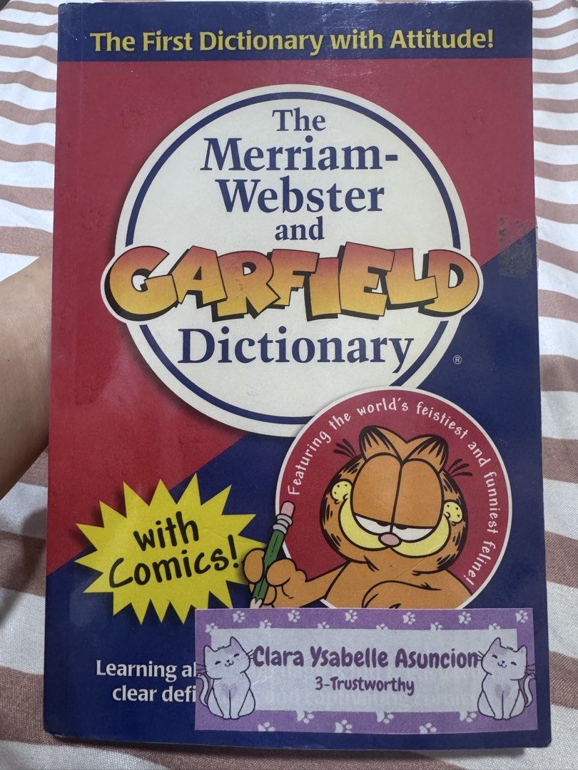 The Merriam-Webster and Garfield Dictionary with Comics! (Category: Children's Books) located in Quezon City. Submitted by jenggayasuncion (Listing ID 1450631959, Image 1). Description: - Learn words with Garfield! - Features fun comics and clear definitions. - The world's feistiest and funniest feline's dictionary. - Great for both learning and fun..