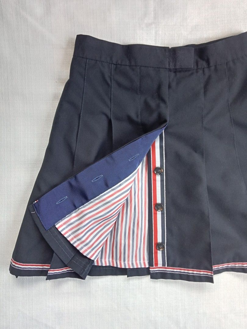 Thom browne pleated mini skirt (Category: Luxury Apparel) located in Bagabag. Submitted by thrift_stories96 (Listing ID 1450719793, Image 3). Description: Thom browne pleated mini skirt With inner cloth Small Waistline - 25 to 26 Length - 16.5 Condition - excellent No flaw.