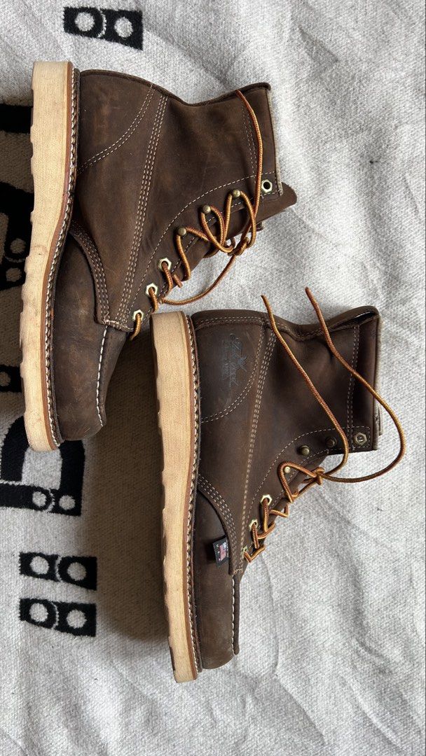 Thorogood American Heritage Moc Toe Boots (Category: Boots) located in Cagayan de Oro. Submitted by nelsondel21723 (Listing ID 1450561815, Image 1). Description: - Thorogood American Heritage moc toe boots - Size US 7.5 - Fits size 8.5 - Rich brown leather upper - White crepe sole with Vibram for excellent traction - Secure lace-up closure - Proudly Made in USA - Built for durability and long-lasting wear.